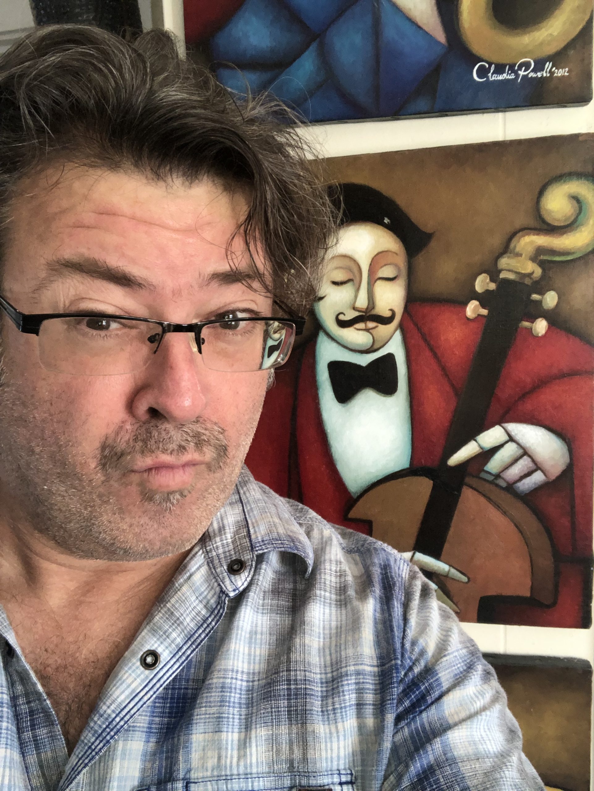 Mitch in front of a painting